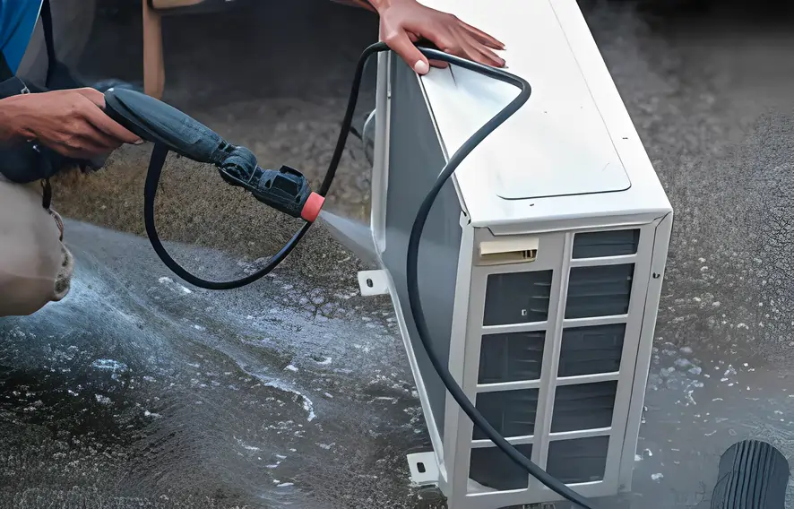 Man Cleaning a AC Outdoor Compressor Unit